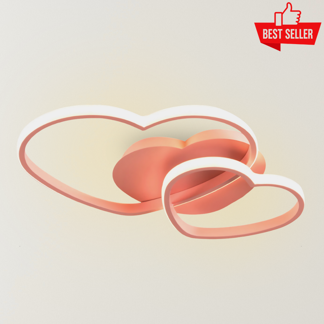 Paris Heart Ceiling Light in soft pink with glowing heart-shaped LED rings, designed as a playful modern ceiling fixture for children’s bedrooms, nurseries, and playrooms.