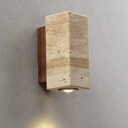 Thimber Japandi wall light in natural wood and metal with soft warm glow