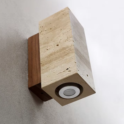 Thimber Japandi wall light in natural wood and metal with soft warm glow